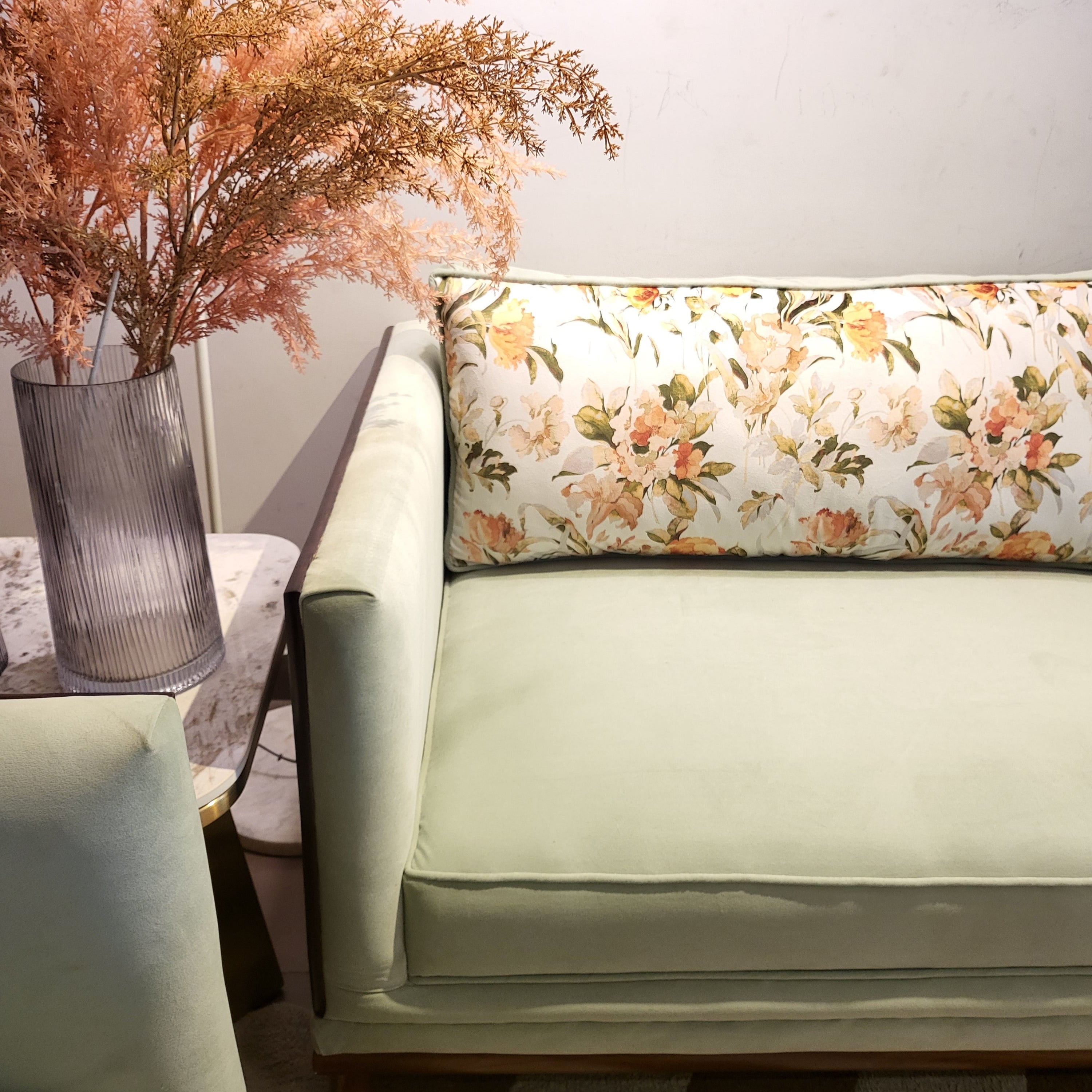 Mint Green Sofa with Floral Cushions