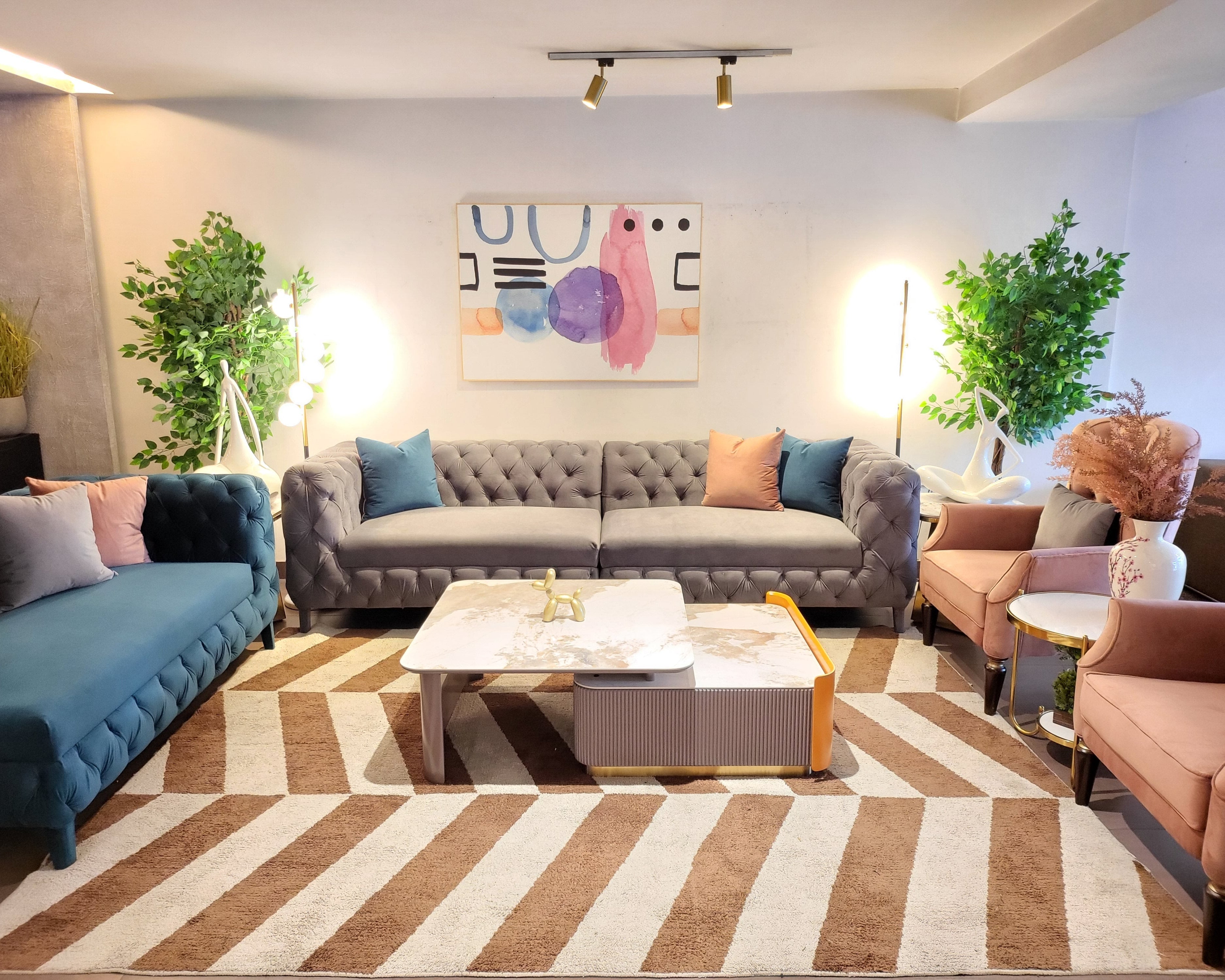 Plush Blue Sofa with Rust Accents